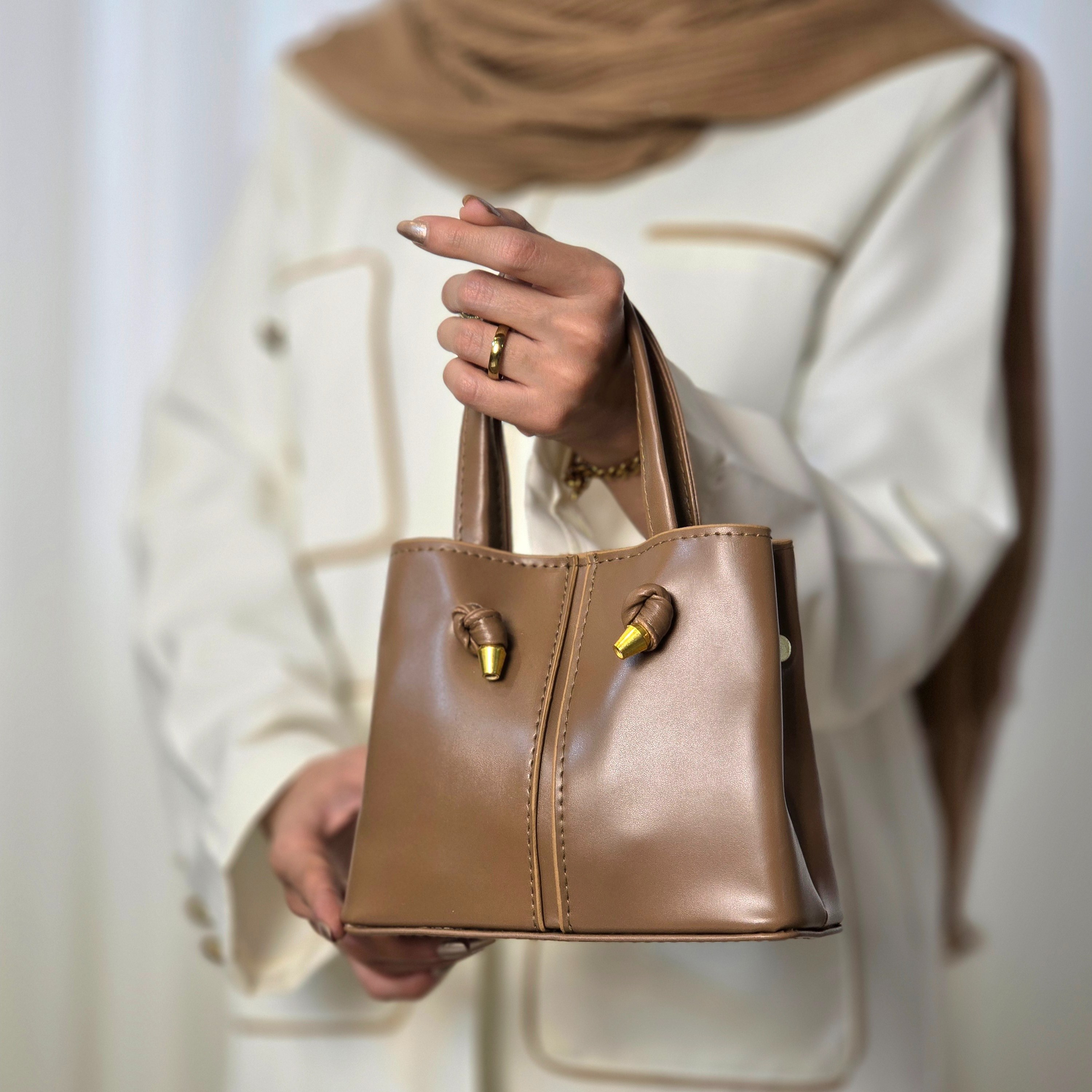 کیف دستی زنانه مجلسی مدل گره ای